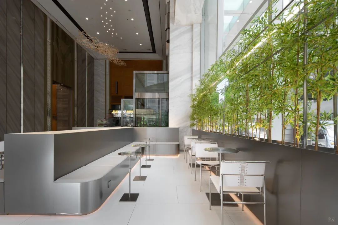 新作丨不锈钢与混凝土的交错：Ticle Coffee系列设计 / 大观建筑