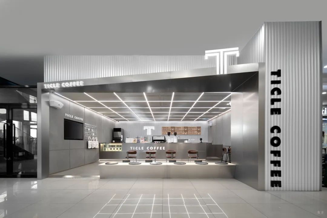 新作丨不锈钢与混凝土的交错：Ticle Coffee系列设计 / 大观建筑