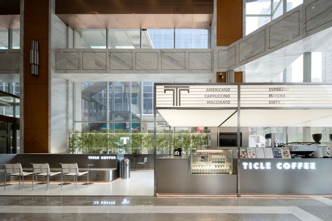 新作丨不锈钢与混凝土的交错：Ticle Coffee系列设计 / 大观建筑